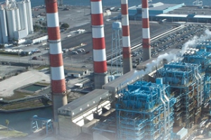The red-and-white-striped smokestacks of the Port Everglades Power Plant are scheduled for demolition July 16, 2013. (Florida Power & Light Company image)
