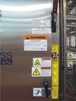 This photograph shows the installation of a voltage indicator and voltage portals in a typical three-phase panel.