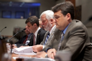 This photo from ntsb.gov shows Dr. Joseph Kolly, director of the Office of Research and Engineering, and Drs. Vernon Ellingstad and Loren Groff presenting the E-AB study May 22 to the board.