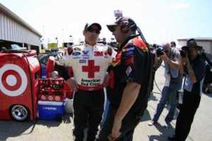 Sprint driver Greg Biffle, center, wears the American Red Cross logo in this photo available on his website.