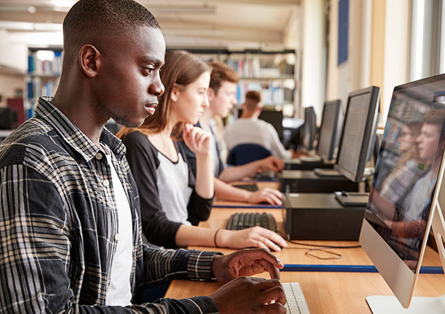 students at row of computers