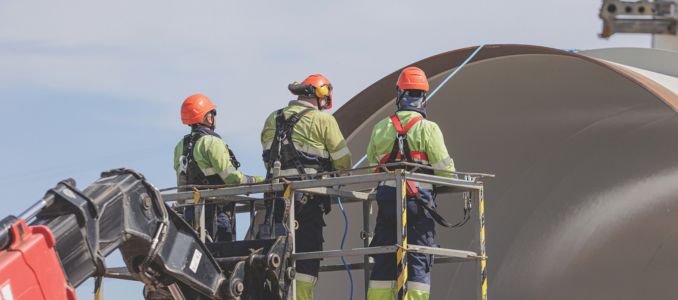 Workers in PPE on an Elevated Platform