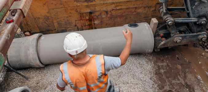 Pipe being installed in a trench