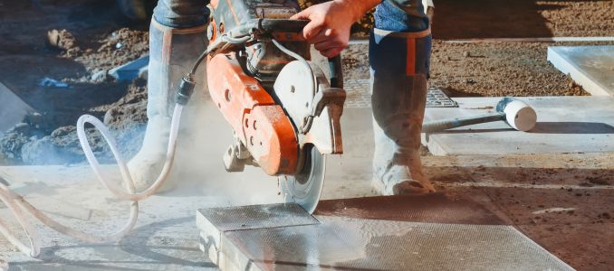 Person cutting tile 