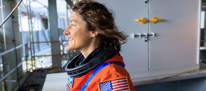 Artemis II NASA astronaut Christina Koch stands on the mobile launcher at Launch Pad 39B