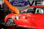 Ford uses a robot simulating the impact of a hard-thrown ball to test air bag sensors on 2009 models