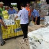 This photo from the Australian Government Disaster Relief site shows donated supplies being readied for flood victims.