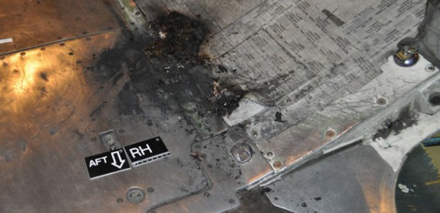 Fire damage to the lower aft cargo compartment of the Boeing 737-700 was contained to an area about 24 inches by 24 inches in size, according to the Transportation Safety Board of Canada