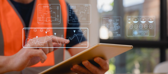 Worker in a high-visibility vest using a tablet with digital safety data and alert overlays.