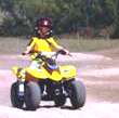 young rider on four-wheel ATV