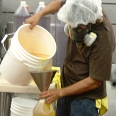 An image of a worker in a diacetyl processing plant.