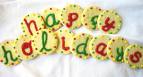 happy holidays spelled on sugar cookies