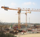 tower cranes in use at a construction site