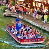 a tour boat on the San Antonio riverwalk, photo by Al Rendon/San Antonio Convention & Visitors Bureau