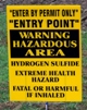 This photograph shows signage indicating the area may have hydrogen sulfide hazards.