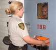 a female correctional officer at work