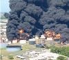 This photo, posted by the Chemical Safety Board, shows the fuel depot burning.