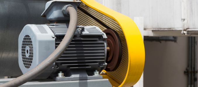 Belt guard protecting machine motor