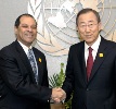 UN Secretary General Ban Ki Moon, right, receives a yellow road safety tag from Ambassador H.E. Fuad Al Hinai, the ambassador of the Sultanate of Oman to the UN.