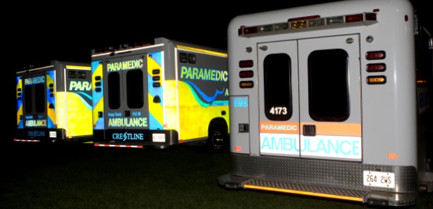 In this side-by-side photo, the newer ambulances on the left are much more visible than the older ambulance in Northumberland County EMS