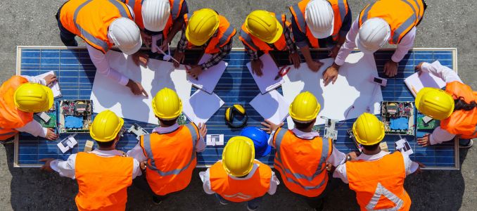 Team of young man and woman architects and engineer