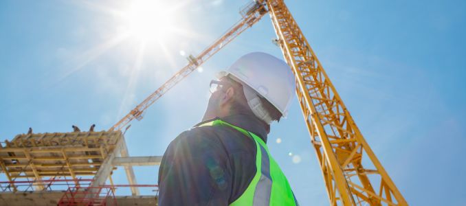 Worker in front of Crane