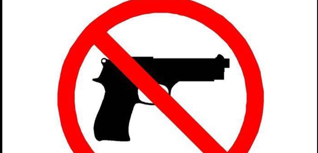The sign indicating that carrying firearms is prohibited must be displayed at the entrance of "statutorily prohibited areas," including schools, hospitals, and sports stadiums. (Illinois State Police graphic)