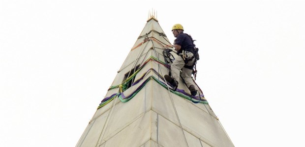 An engineer checked for damage done to the Washington Monument, a 555-foot obelisk located on the national mall in Washington, D.C., by a 5.8 magnitude earthquake on Aug. 23, 2011. The monument underwent repairs and was reopened May 12, 2014.