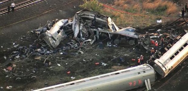 Amtrak announced May 26 it will install inward-looking cameras on the locomotives used on its Northeast Corridor trains, following the May 12 derailment near Philadelphia, its aftermath shown here.
