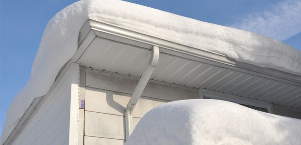OSHA Reminds Workers and Employers to be Safe While Removing Snow from Rooftops
