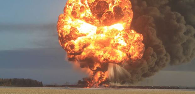 This photo showing the fireball resulting from the derailment of 21 cars from a BNSF crude oil train in Casselton, N.D., is included in the NTSB Hazardous Materials Group Factual Report. (Photo courtesy of Dawn Faught)