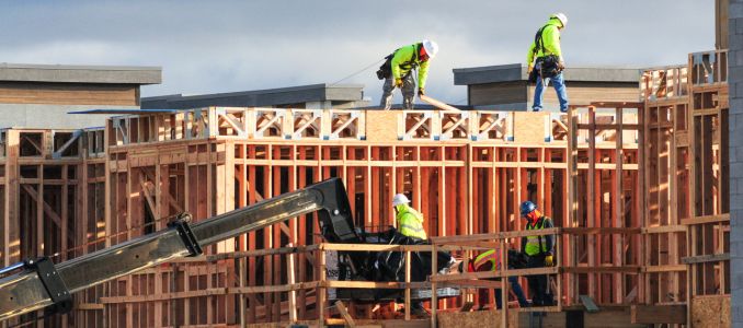 Construction Workers Framing a House