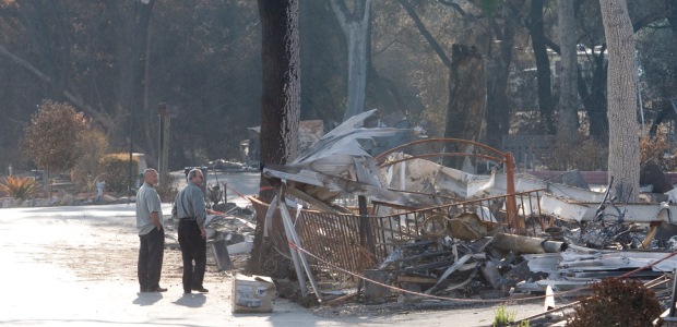 A wildfire damaged mobile homes and property in Fallbrook, Calif., in 2007. (Photo by Andrea Booher/FEMA)