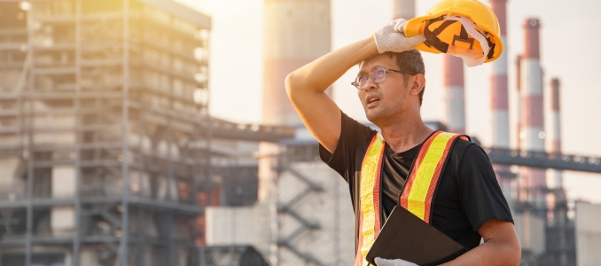 Engineer worker tired fatigue exhausted man working outdoor in hot weather danger from heat stroke