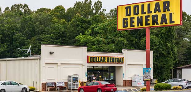 A Dollar General store with a tall Yellow sign displaying the store name