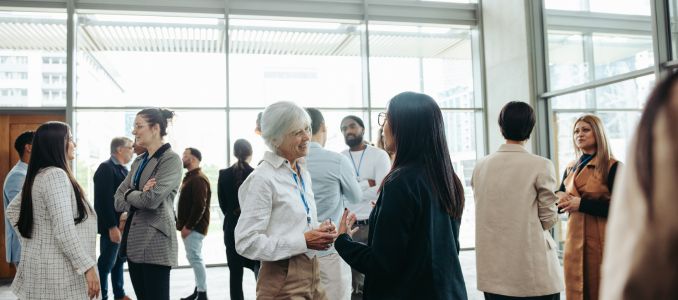 People Gather at a Conference