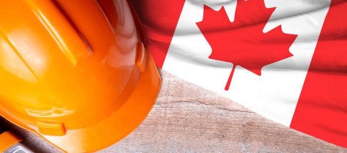 Hard hat next to Canadian flag
