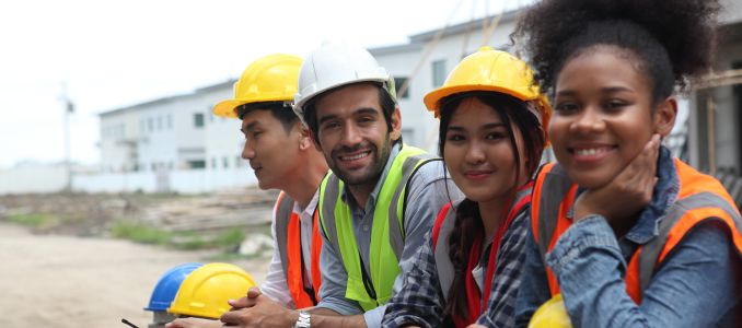 Group of construction workers smiling