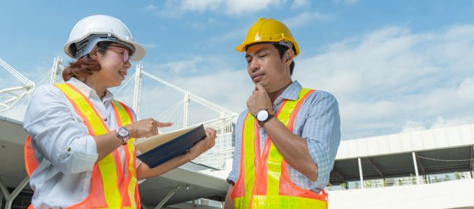 Two safety professionals speaking