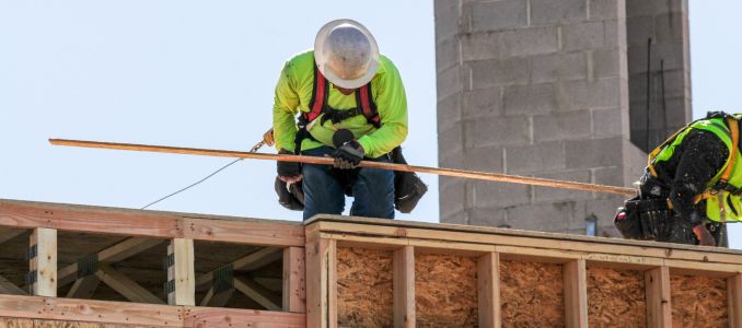 Construction workers on roof