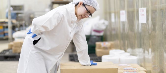 Factory worker suffering from back pain