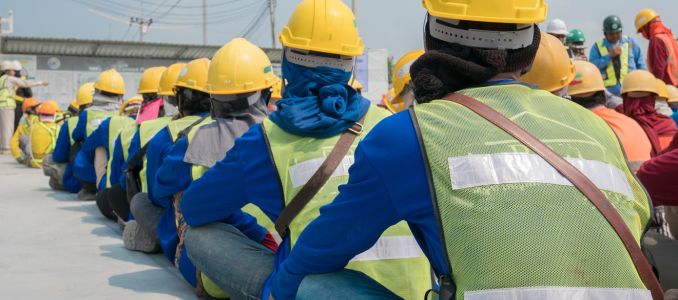 Construction workers gathered for meeting
