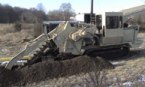 a trench cutting machine in action