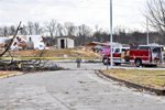 This U.S. Army photo taken by Sgt. Heather Denby shows soldiers checking military housing after a tornado struck Fort Leonard Wood, Mo., on Dec. 31, 2010.