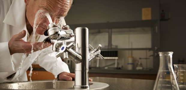 A combination eyewash and faucet unit places the eyewash station where workers are most likely to turn in the emergency: the sink. The eyewash functions without having to turn on the faucet, so there is never a danger of scalding water on the eyes.