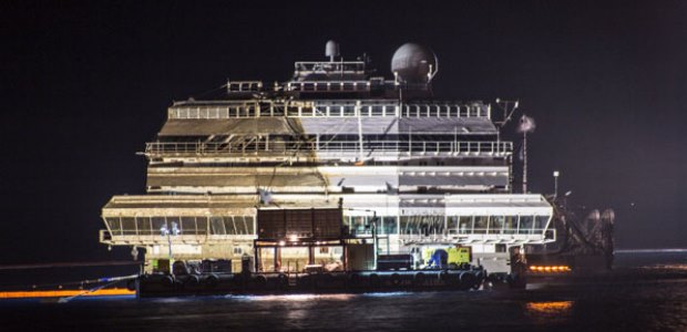 Now that uprighting the ship has been accomplished, the task of repairing damage so it can towed to be demolished can begin.