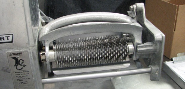 OR-OSHA said its inspection showed the guard had been missing for two years on this meat tenderizing machine before the injury. (OR-OSHA photo)