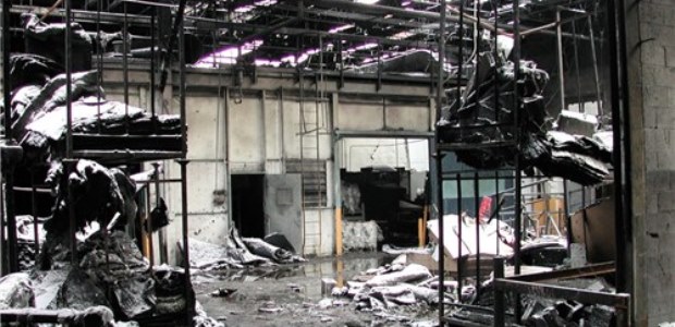 This CSB photo shows the aftermatch of the dust explosion and fire on Feb. 20, 2003, at the CTA Acoustics manufacturing plant in Corbin, Ky. killing seven workers.