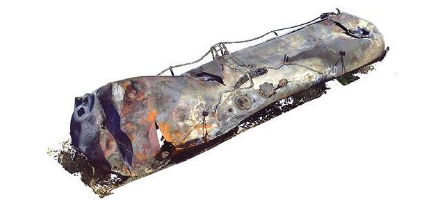 Three-dimensional laser scanning was performed on some of the derailed tank cars and showed the shells of the tank cars exhibited impact damage ranging from localized buckles to large-scale buckling, and they sustained significant reductions in volume. (Image downloaded from Transportation Safety Board of Canada investigation report R13D0054)