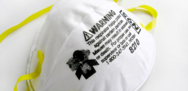 All respirators, including filtering facepieces, must be selected based on the hazard and must be certified by NIOSH. If your dust mask does not bear the NIOSH approval label, it can